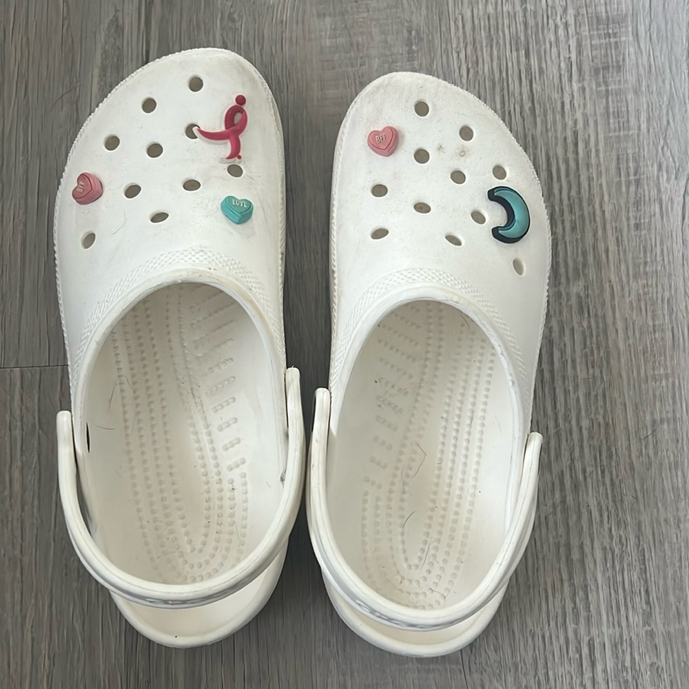 Size 10 women crocks.   Size 8 boys I guess.  See pic.   Barely worn.